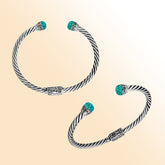 Sterling silver cuff bangle with turquoise shell cabochons and Balinese detailing, handmade in Bali.